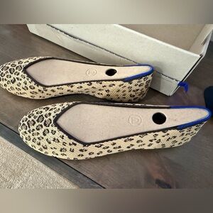 Rothy's Beige Leopard-Print Ballet Flats with Black Trim and Blue Heel Accent